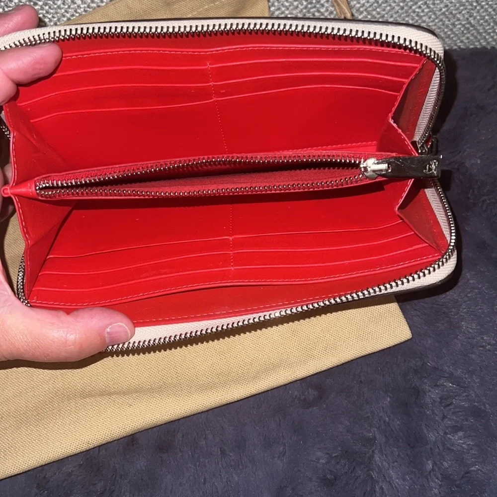 EUC Authentic Christian Louboutin Panettone pale pink zippy wallet and dust bag